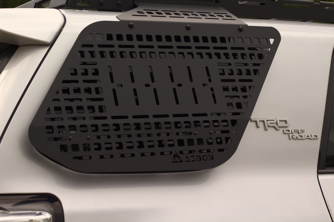 Side view of the 4Runner rear window Molle panel showing the no-drill installation hardware included.