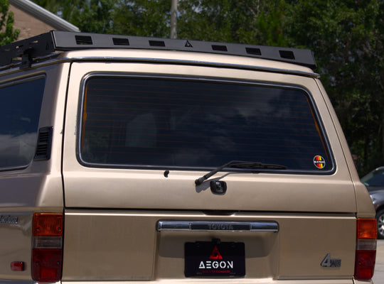 Heavy-duty FJ60 overland roof rack with a 900 lbs static load capacity, ideal for rooftop tents.