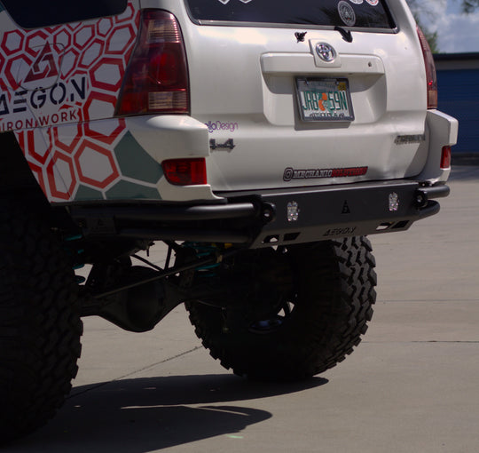 Durable black powder coat finish on a 3/16 inch steel 4Runner rear bumper.