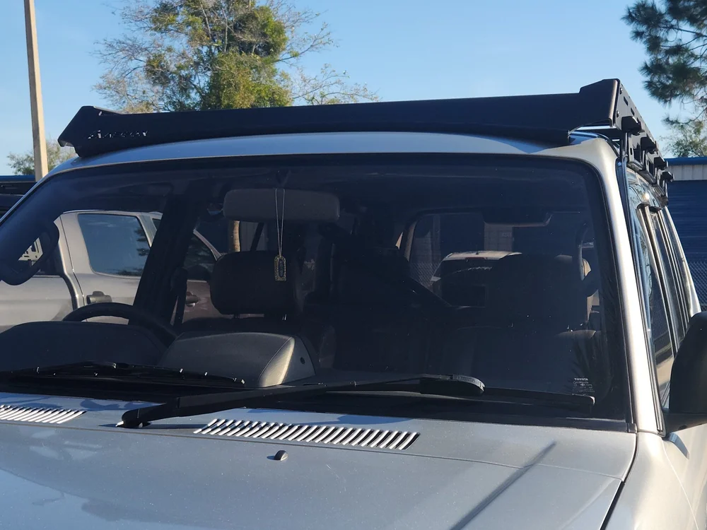 Complete Toyota Prado 90/95 rack kit including 2 side rails, 5 crossbars, and 2 wind deflectors.