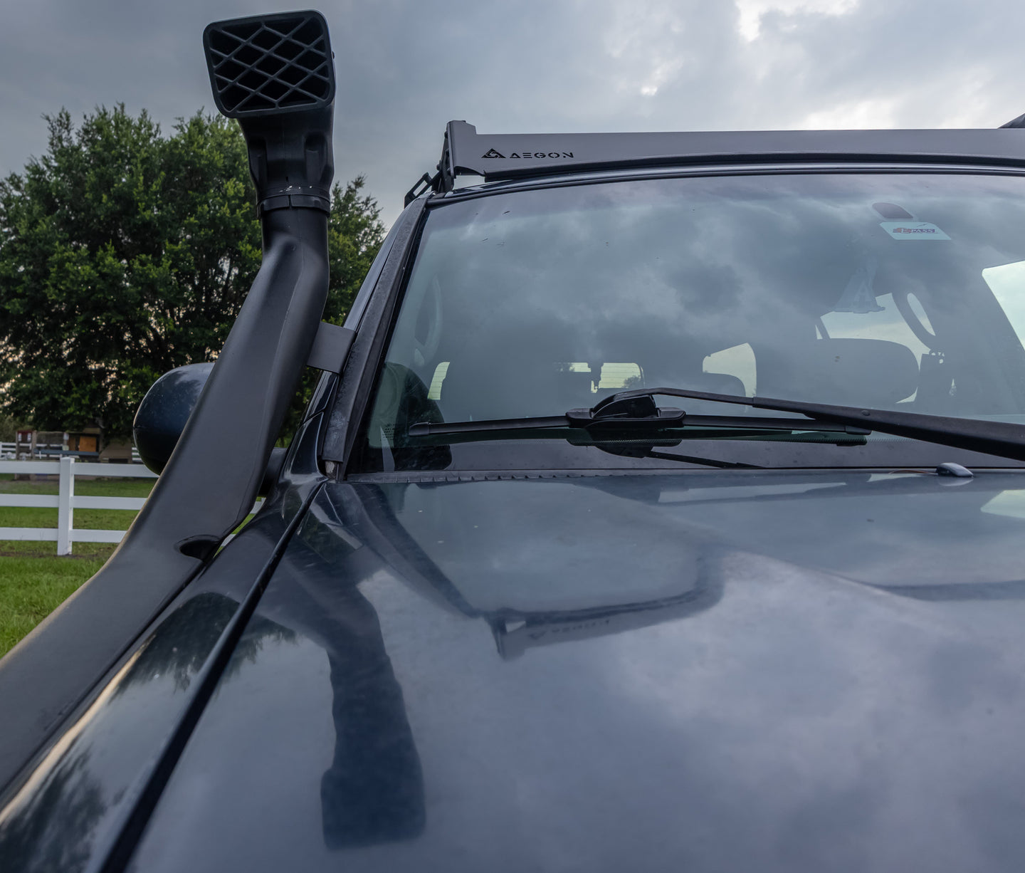 Complete Aegon roof rack system for Toyota Sequoia including side rails, 6 crossbars, and aerodynamic wind deflectors.