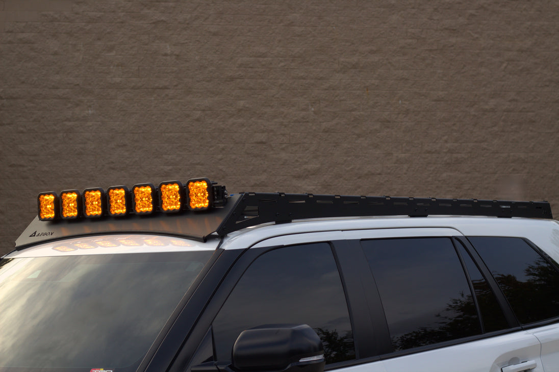 Complete Aegon roof rack kit for Toyota Sequoia featuring 2 side rails, 6 adjustable crossbars, and a lifetime structural warranty.