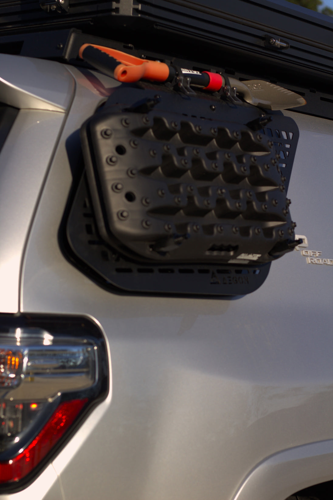 Close-up of a lightweight aluminum Molle panel with a durable black powder coat finish for corrosion resistance.