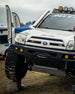 Close-up of Baja Design light integration on a 4th Gen 4Runner front bumper.