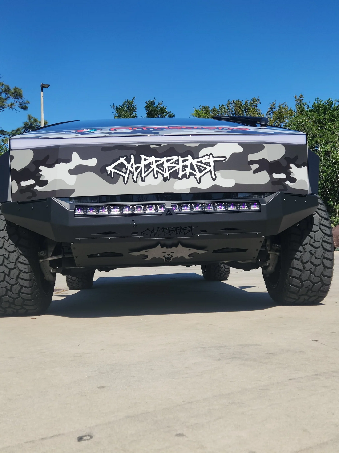 Sleek black powder-coated finish on a lightweight aluminum front bumper for Tesla Cybertruck.