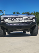 Sleek black powder-coated finish on a lightweight aluminum front bumper for Tesla Cybertruck.