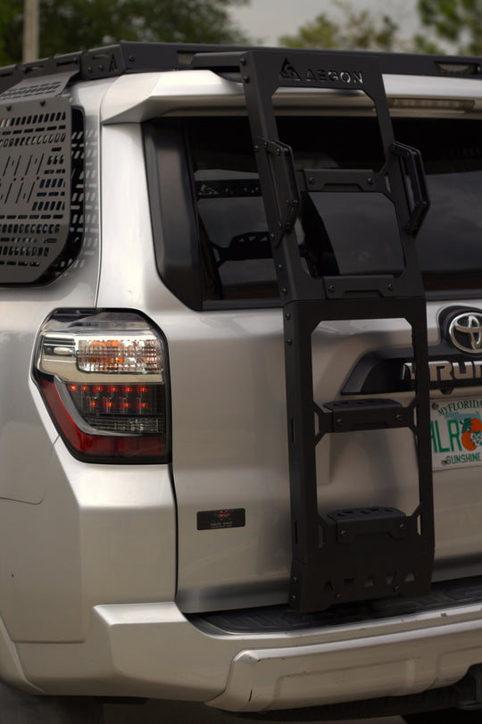 Driver side mount aluminum ladder for Toyota 4Runner, lightweight and corrosion-resistant.