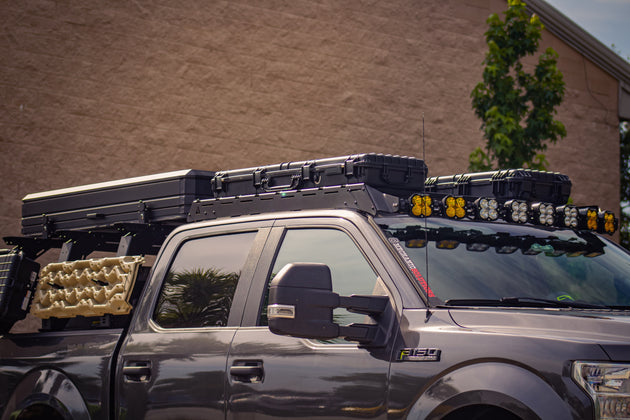 Premium black aluminum roof  rack designed specifically for Ford F-150 13th Generation models from 2015 to 2020.