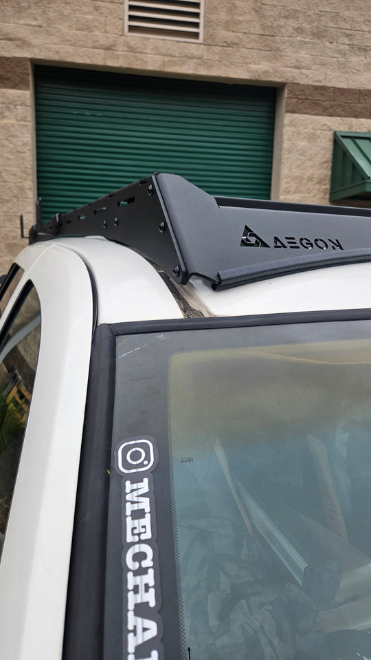 Full-length 82x43 inch steel cargo rack for Jeep Grand Cherokee WJ featuring a black powder-coated finish.
