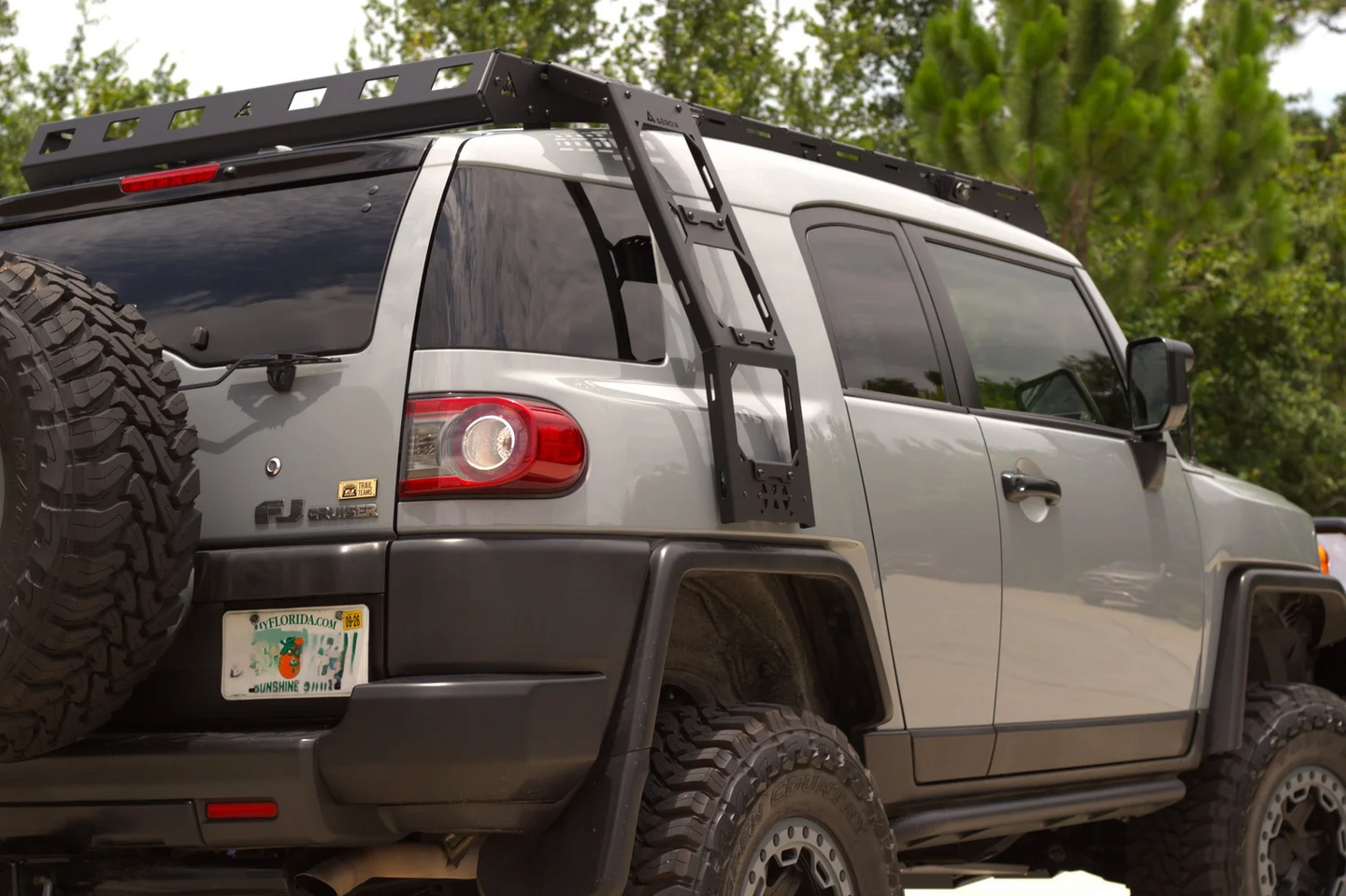 Heavy-duty Toyota FJ Cruiser side ladder with 320 lbs load capacity and ergonomic non-slip steps for safe climbing.