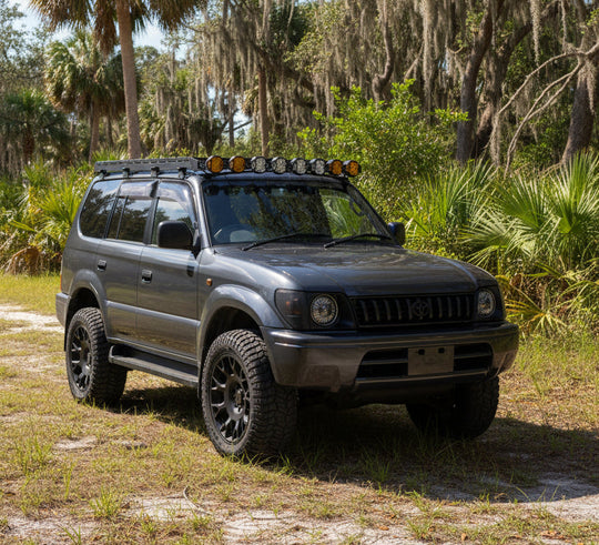 Heavy-duty roof rack for Toyota Prado 90 Series with 900 lbs static and 600 lbs dynamic load rating.