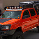 Ultra-lightweight 28 lb aluminum roof rack for Tacoma featuring a durable black powder coat finish and CNC laser-cut construction.