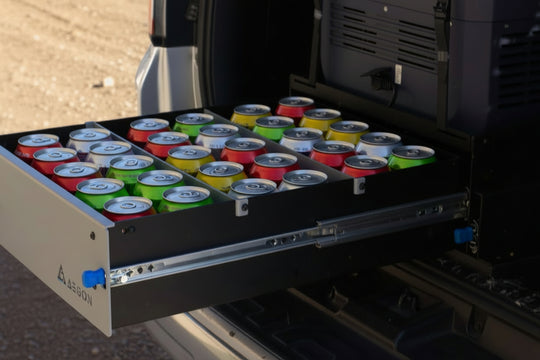 Secure locking rail system fridge slide, engineered to stay in place during steep inclines and rough off-road terrain.