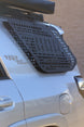 Sleek low-profile Molle panel design for Toyota 4Runner that maintains rear visibility while adding storage.
