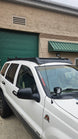 Precision CNC laser-cut steel roof rack made in the USA for the Jeep Grand Cherokee WJ platform.