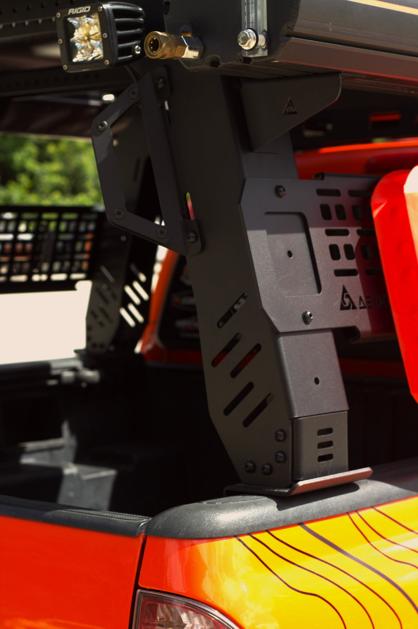 Securely mounting recovery boards like Maxtrax to the side of the AEGON aluminum bed rack.