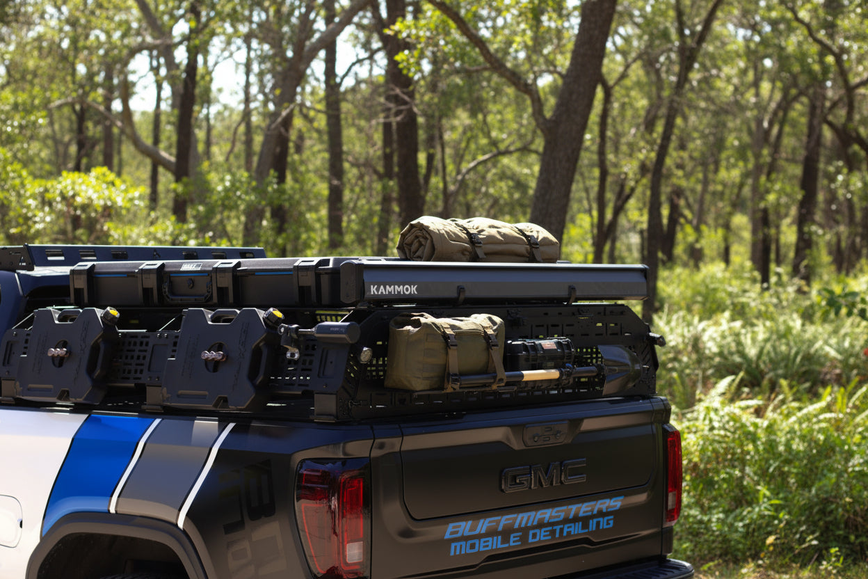 Side accessory slots for secure mounting of shovels and hi-lift jacks on off-road bed rack.