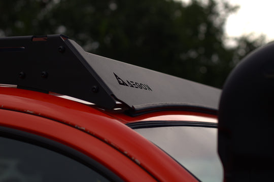 No-drill bolt-on roof rack system for Toyota Tacoma including all necessary assembly hardware and side rails.