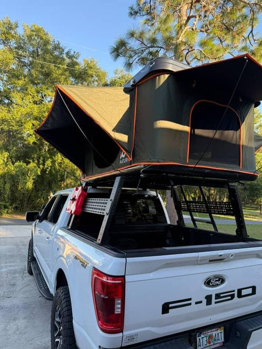Black powder-coated rust-resistant finish on GA 12 steel bed rack for all-weather protection.