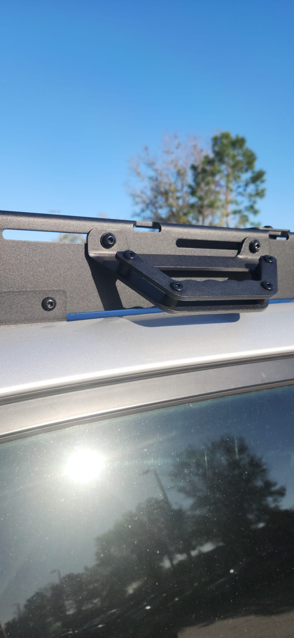 Rust-resistant ergonomic aluminum handle for overlanding vehicles made in the USA with free shipping.
