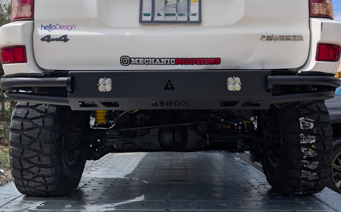 Rear view of a 4th Gen Toyota 4Runner with a black high-clearance steel bumper.