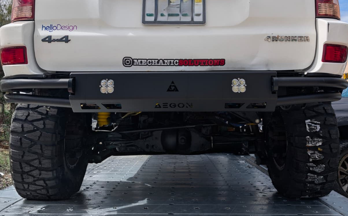 Rear view of a 4th Gen Toyota 4Runner with a black high-clearance steel bumper.