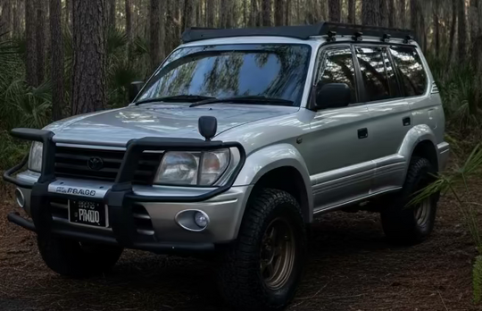 Heavy-duty steel roof rack designed for Toyota Prado 90 and 95 series models from 1996 to 2002.