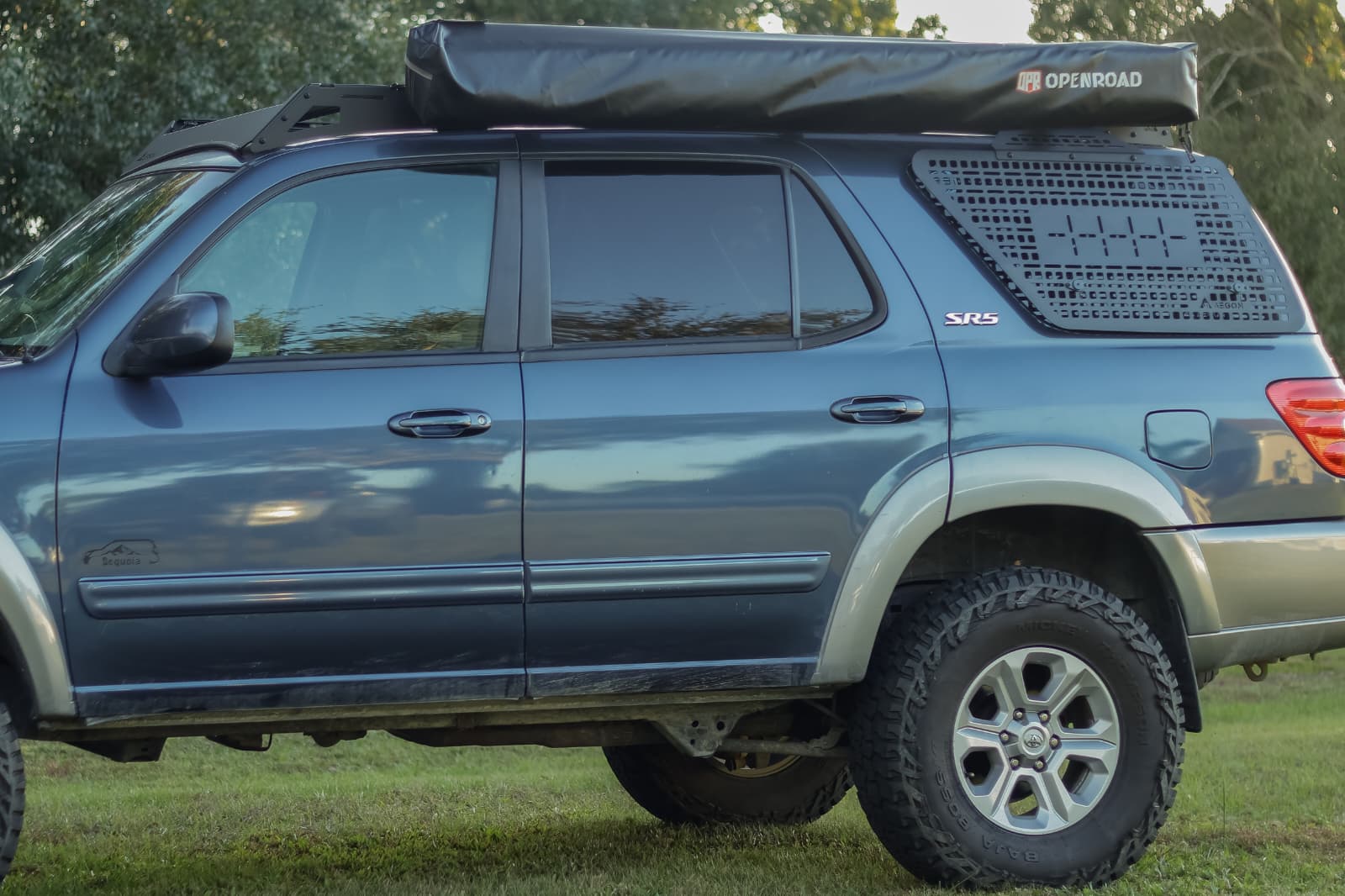 Interior aluminum Molle panel for 1st Generation Toyota Sequoia (2001-2007) rear window cargo organization.