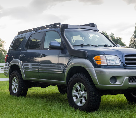 Full-length heavy-duty steel roof rack custom-fit for 1st Generation Toyota Sequoia models from 2001 to 2007.