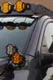 Close-up of hood side light mounts integrated with ditch light brackets on a Tundra.