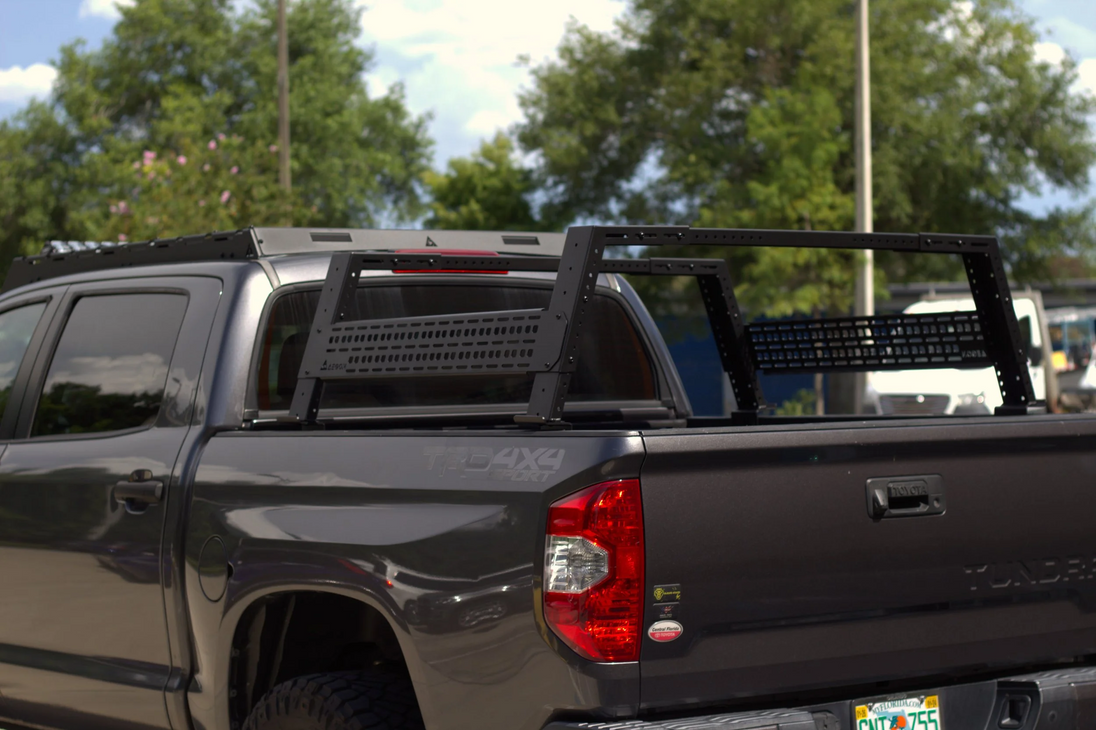 Universal fit bed rack with adjustable height from 14 to 21 inches for off-road expeditions.