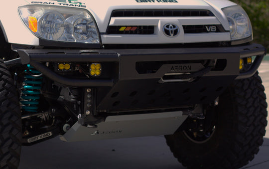 Detail view of the winch mount and integrated recovery points for off-road shackles.
